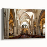 Framed canvas of a vintage-style landscape painting depicting Valencia, Spain, with vibrant colors on a black background.