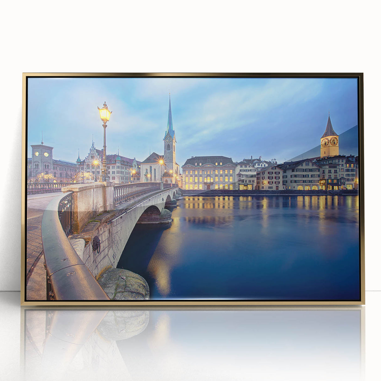 Large art print of a Swiss landscape in muted green and blue tones, framed in gold acrylic.