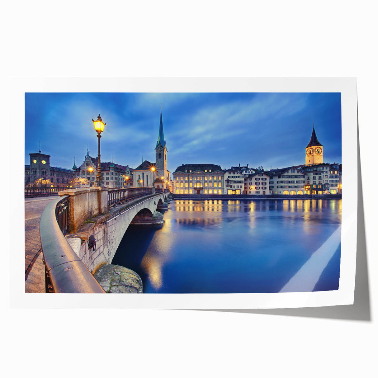 Rolled canvas print of a serene Swiss landscape with vibrant green meadows and snow-capped mountains.