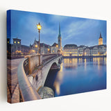 Landscape painting of a Swiss village on stretched canvas, featuring muted green and blue tones, ideal for kitchen wall art.