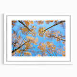 Abstract art print of a European landscape in muted earth tones, framed with a white mat, suitable for dining room decor.