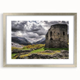 Textured art print featuring an abstract Welsh landscape in muted earth tones, framed in silver, ideal for bedroom decor.