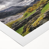 Art deco poster of a scenic Welsh landscape in muted greens and blues on a rolled canvas, suitable for dining room decor.