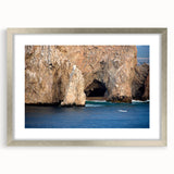 Textured art print of abstract Baja California scenery in muted earth tones on a framed silver mat, ideal for bedroom decor.