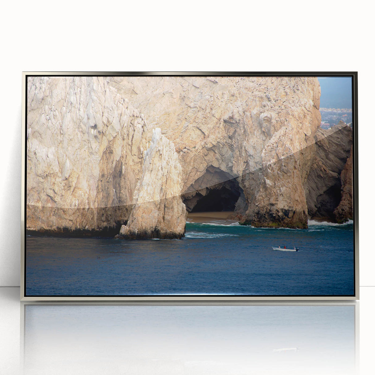 Mid-century modernist art depicting Baja California scenery in muted earth tones on a silver-framed acrylic print.