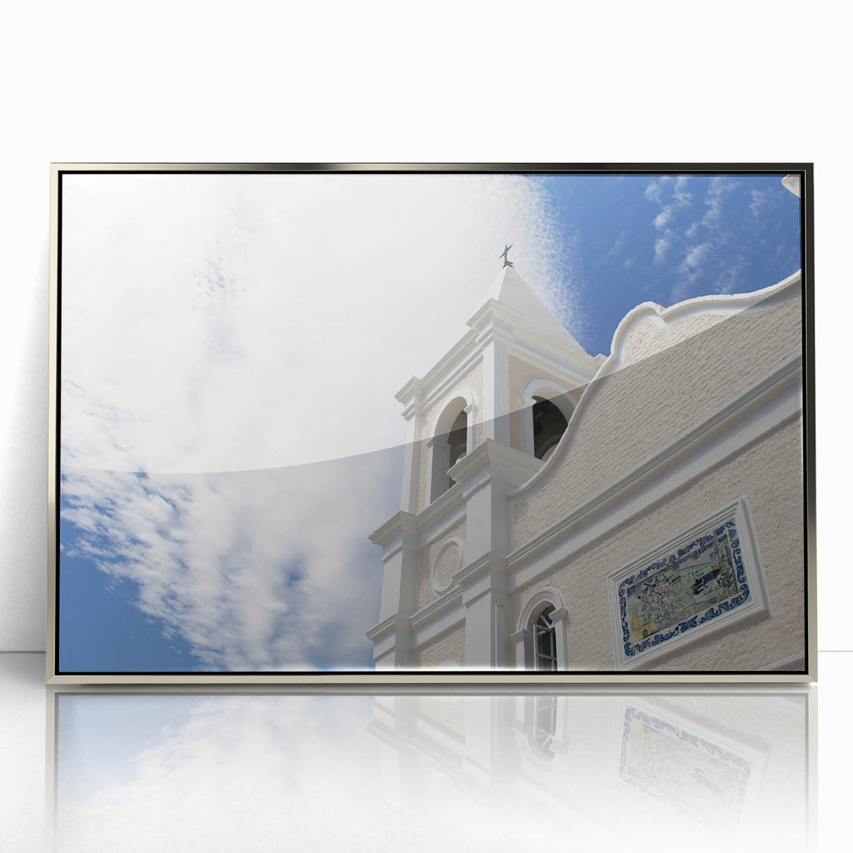 Mid-century modernist art depicting Cabo San Lucas scenery in muted earth tones on a silver-framed acrylic print.