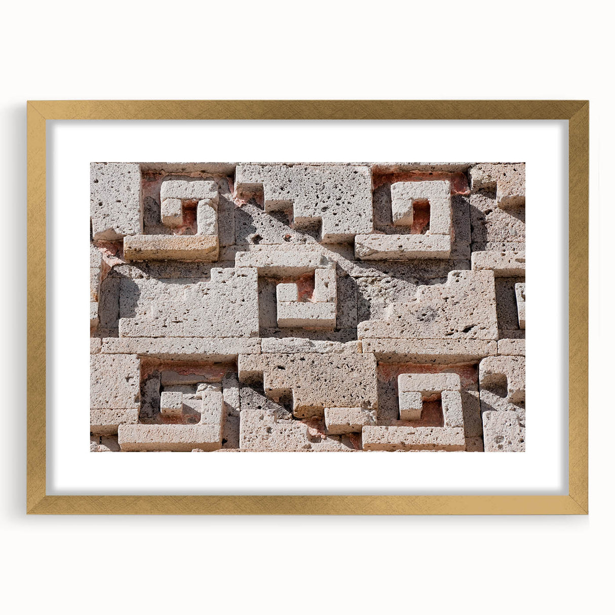 Textured abstract art print depicting Oaxaca scenery in muted earth tones, framed in gold, ideal for bedroom art.