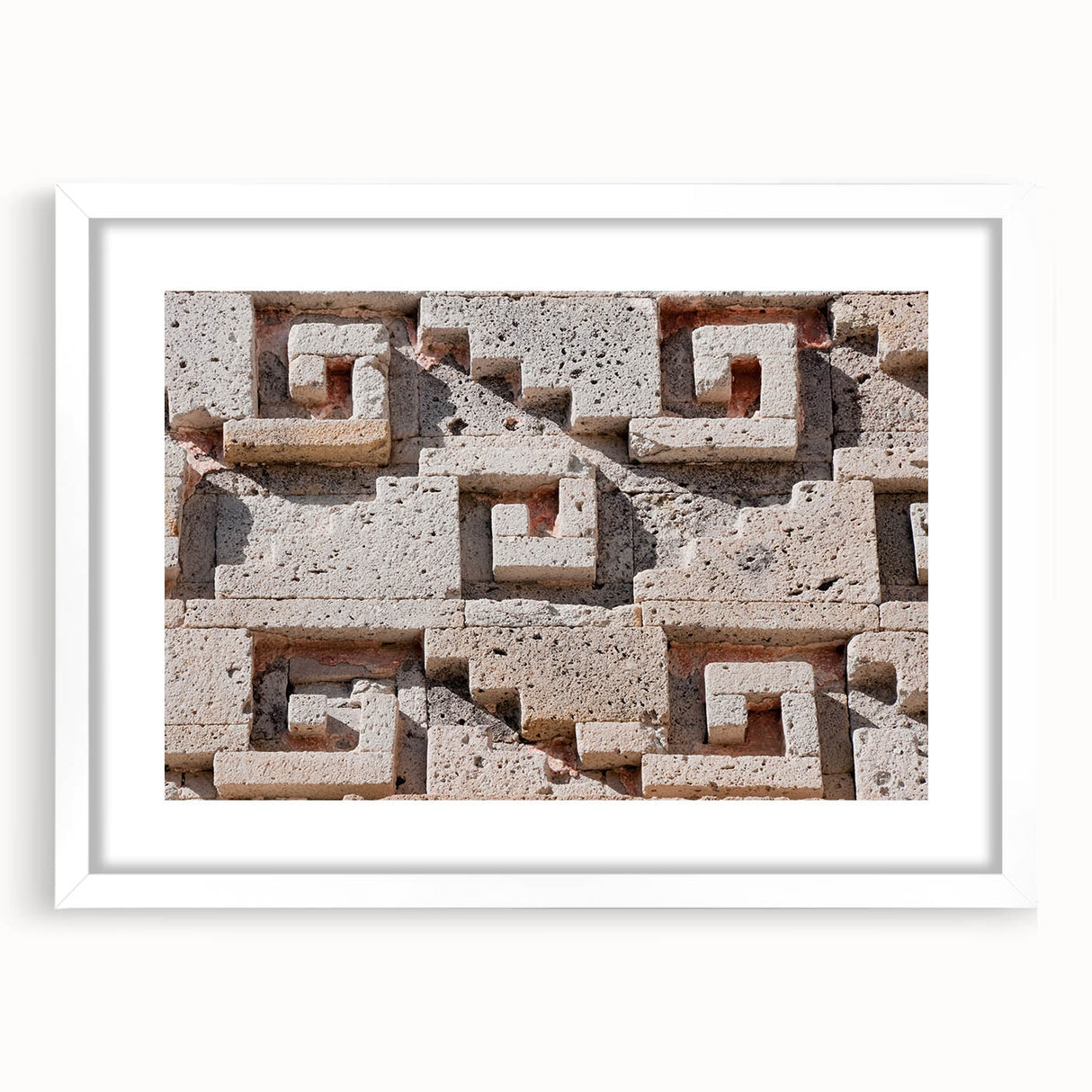 Large abstract wall art depicting a Mexican Oaxaca landscape in vibrant sunset tones, framed with a white mat.