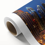 Art deco poster of Dubai skyline in muted gold and blue tones on rolled canvas.