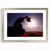 Textured abstract art print of a Middle Eastern scenery in muted earth tones, framed in silver, ideal for bedroom art.