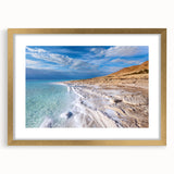 Extra large textured abstract art print of the Dead Sea in muted earth tones, framed in gold, ideal for living room decor.