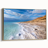 Framed canvas of the Dead Sea landscape in muted gold and black tones, ideal for bedroom wall art.
