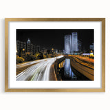 Extra large abstract art print of Tel Aviv skyline in muted gold and beige tones on a framed canvas.