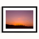 Extra large abstract art print depicting a colorful, textured Middle Eastern landscape on a framed black mat.