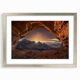 Textured abstract art print depicting a Middle Eastern scenery, in muted earth tones, framed with a silver mat.