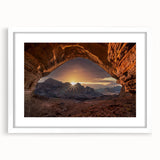 Abstract art print featuring muted earth tones of a Saudi Arabian landscape on a framed white mat.