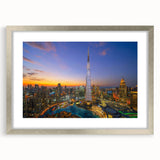 Textured art print of Burj Khalifa in abstract style with silver frame, ideal for modern bedroom ambiance.