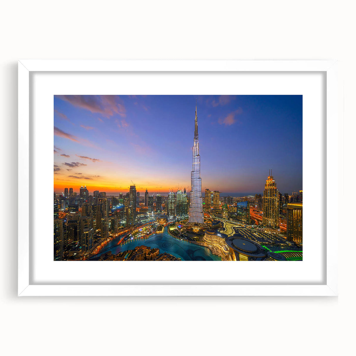 Abstract art print of Burj Khalifa in muted gray and blue tones on a framed white mat.