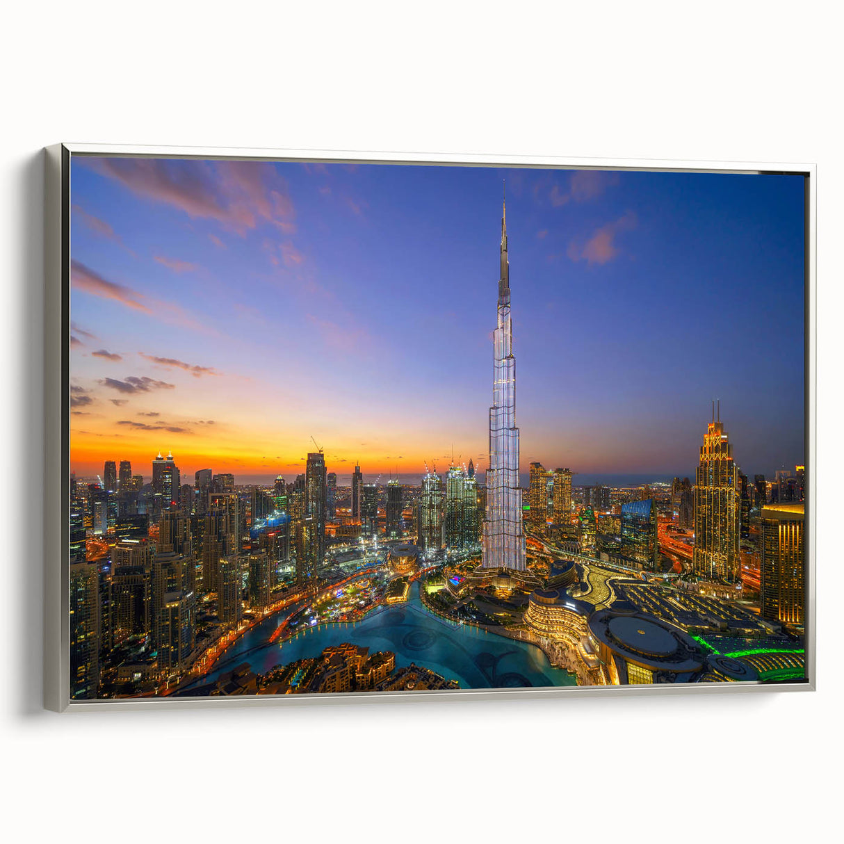 Framed canvas featuring a grayscale image of the Burj Khalifa, ideal for modern office decor.