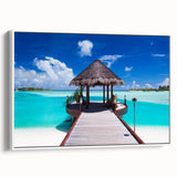 Vintage poster art of Bora Bora scenery on a framed canvas, featuring vibrant ocean blues and lush greens.