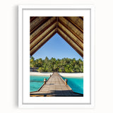 Abstract art print of a Tahitian landscape in soft pastel blues and greens on a white-framed canvas.