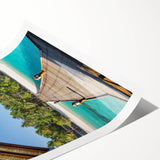 Extra large rolled print of a serene Tahitian landscape with lush florals in vibrant green and blue tones.