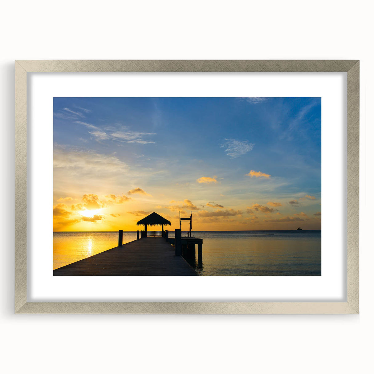 Textured abstract art print of Micronesian scenery in muted blue and green tones, framed with a silver mat.