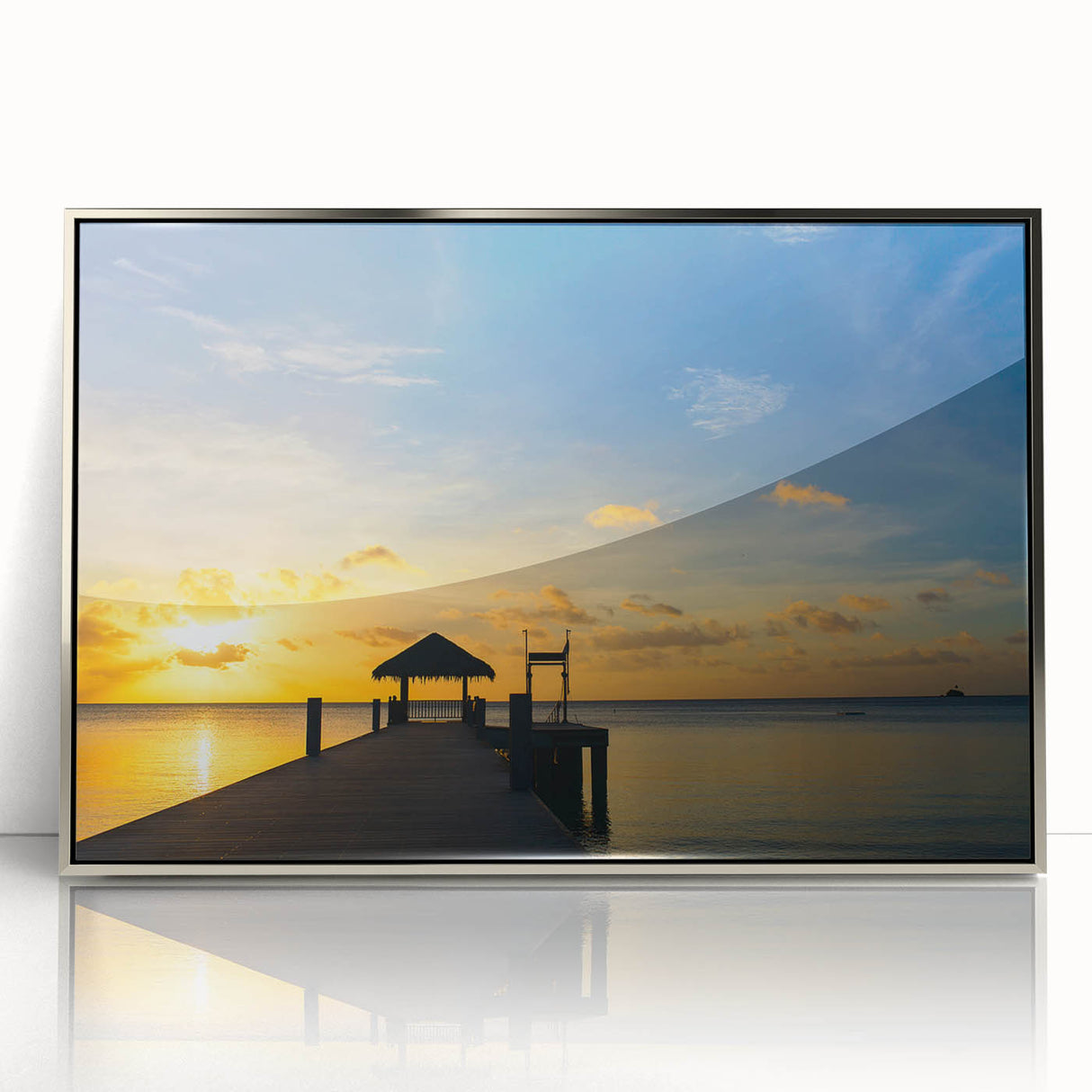 Mid-century modernist art depicting Micronesian oceanic scenery in pastel shades on a silver-framed acrylic print.