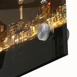 Large abstract wall art of Auckland skyline in muted blue and gray tones on acrylic glass, ideal for dining room ambiance.