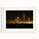 Abstract art print of Auckland skyline in muted gray and blue tones on a framed white mat, ideal for dining room decor.