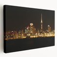 Side view of a stretched canvas depicting the Auckland skyline in muted blues and greens, suitable for kitchen wall art.