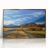 Large art print of a serene New Zealand Canterbury landscape in muted green and blue tones on a gold-framed acrylic.