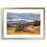 Abstract art print of Otago, New Zealand, featuring muted earth tones on a framed silver mat, ideal for dining room decor.