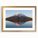 Extra large abstract art print of Taranaki, New Zealand, in gold frame, featuring textured blues and greens.