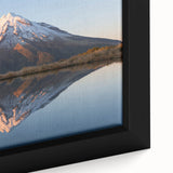 Close-up of a framed canvas depicting Taranaki, New Zealand in black with colorful.