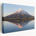 Side view of a stretched canvas depicting Taranaki, New Zealand scenery in soft blue and green tones.