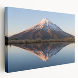 Side view of a stretched canvas depicting Taranaki, New Zealand scenery in soft blue and green tones.