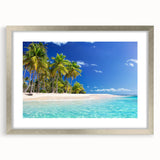 Textured abstract art print depicting ocean waves in muted blue and gray tones, framed in silver, ideal for bedroom art.