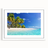 Abstract art print featuring oceanic scenery in muted blue tones on a white framed canvas.