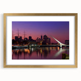 Extra large abstract art print depicting a textured scene of Buenos Aires in muted earth tones, framed with a gold mat.