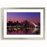 Abstract textured art print of a South American scenery in muted earth tones, framed in silver, ideal for bedroom decor.