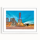 Abstract art print depicting a stylized Argentinian landscape in muted earth tones, framed in white.