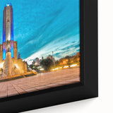 Framed canvas depicting a black and colorful textured art scene of a South American landscape, ideal for living room decor.