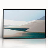 Large abstract wall art featuring a stylized South American landscape in muted earth tones, framed in black acrylic.