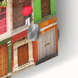 Large abstract wall art depicting a Colombian landscape in muted earth tones on acrylic glass.