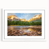 Abstract art print of a Venezuelan landscape in muted earth tones, framed with a white mat, suitable for dining room decor.