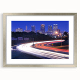 Textured abstract art print of Alabama scenery in muted earth tones, framed in silver, ideal for bedroom decor.