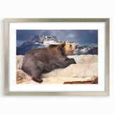 Textured art depicting abstract Denali scenery in silver frame, ideal for bedroom ambiance.