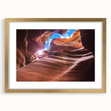 Extra large wall art featuring a textured abstract print of the Arizona Antelope Canyon in muted earth tones, framed in gold.