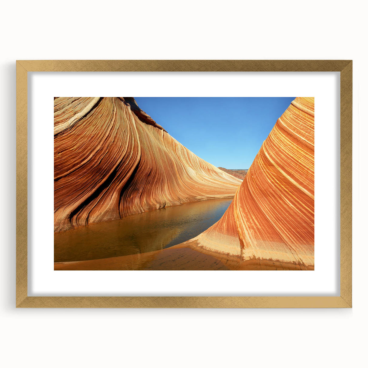 Extra large abstract art print of Arizona's Coyote Buttes in textured style, with muted earth tones, framed in gold.